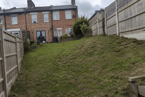 Sloped back garden in South East London needing levelling